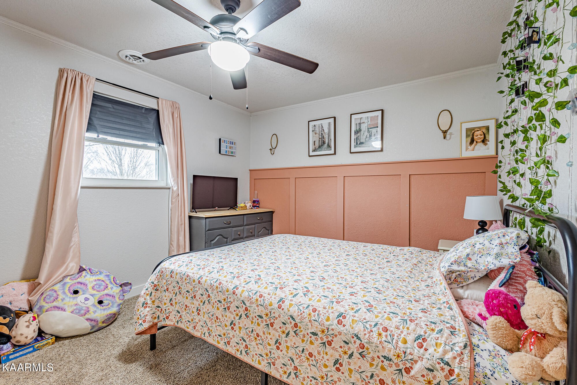 112 County Road 142 Riceville, TN 37370 - Photo 21 of 28 a bedroom with a bed and a chandelier