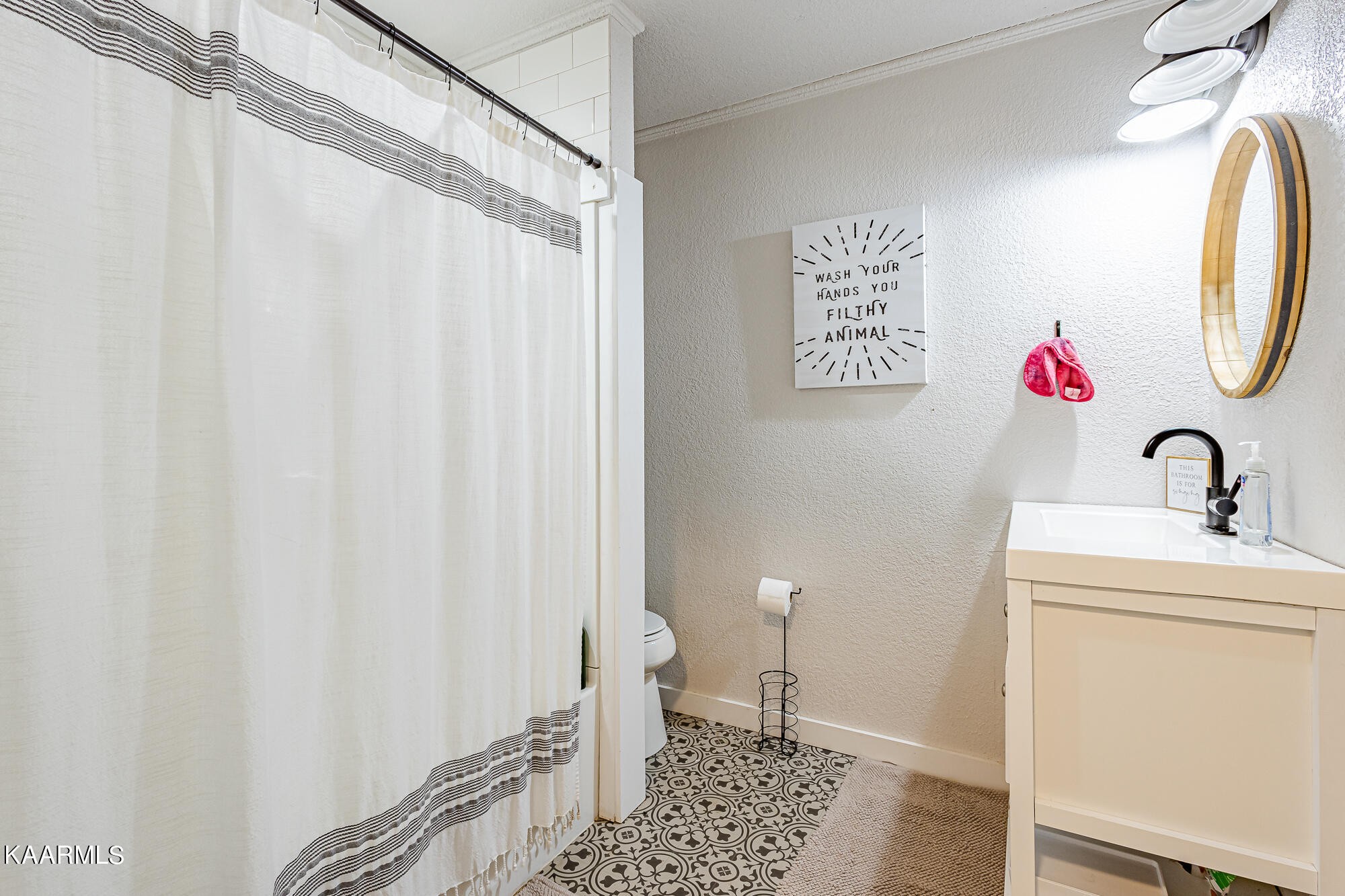 112 County Road 142 Riceville, TN 37370 - Photo 24 of 28 a bathroom with a sink and a mirror