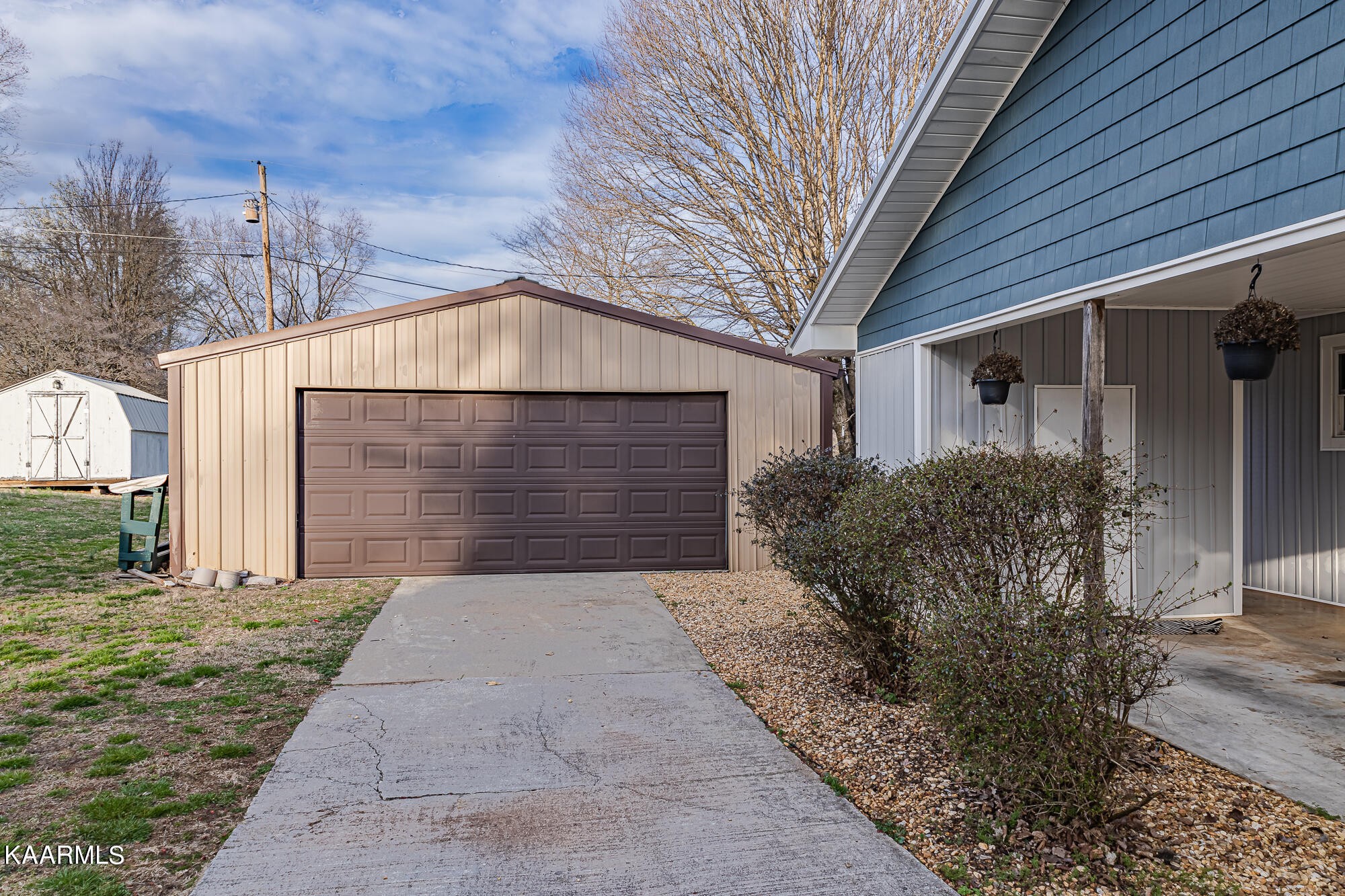 112 County Road 142 Riceville, TN 37370 - Photo 27 of 28 a front view of a house with garden