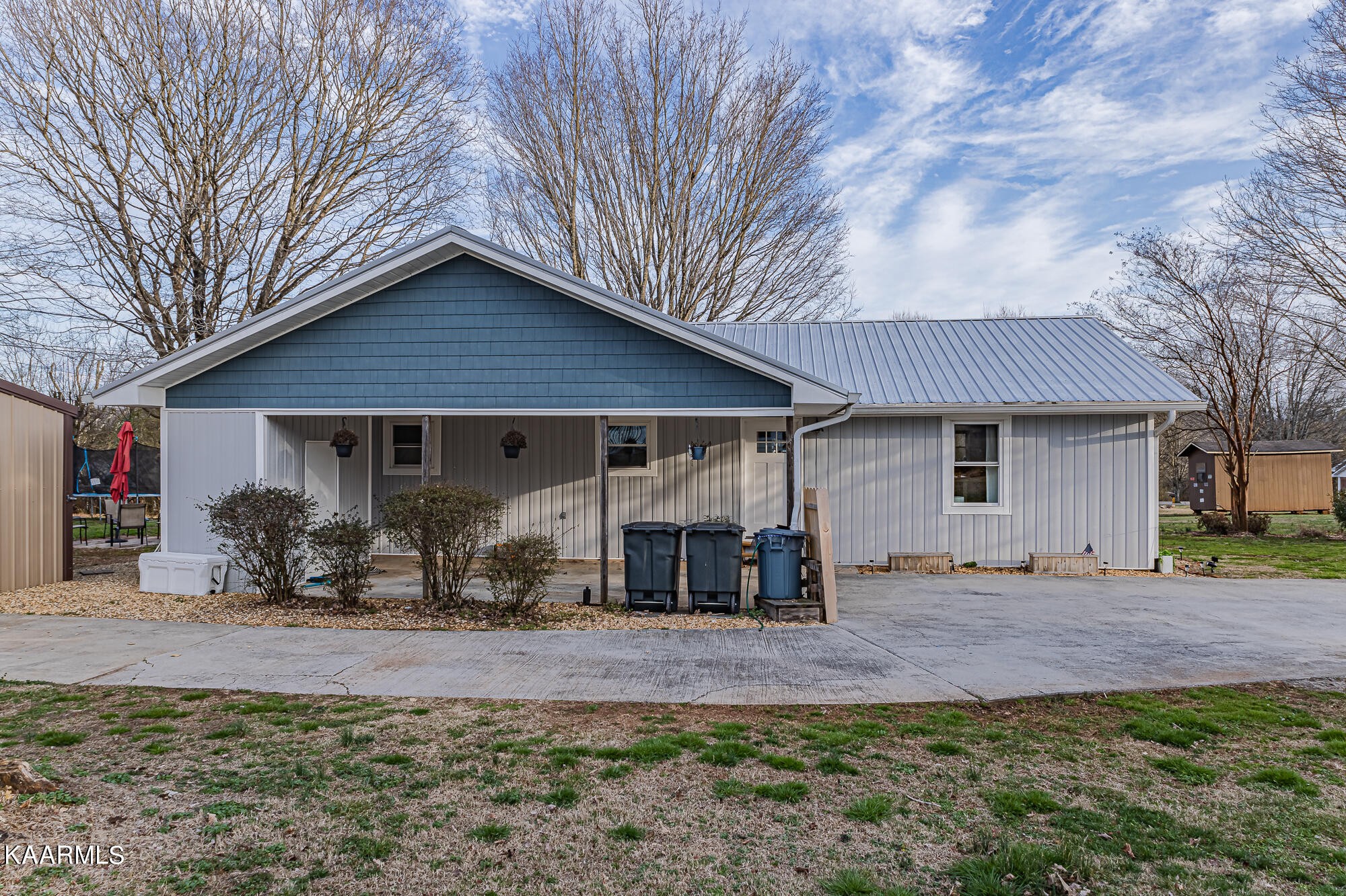 112 County Road 142 Riceville, TN 37370 - Photo 3 of 28 a front view of a house with a yard