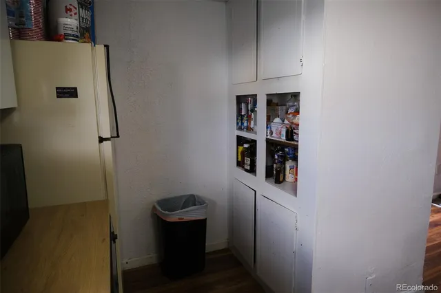 a bedroom with bed and a window