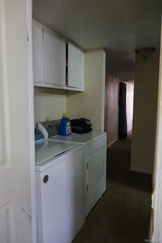 a bedroom with a bed and flat screen tv