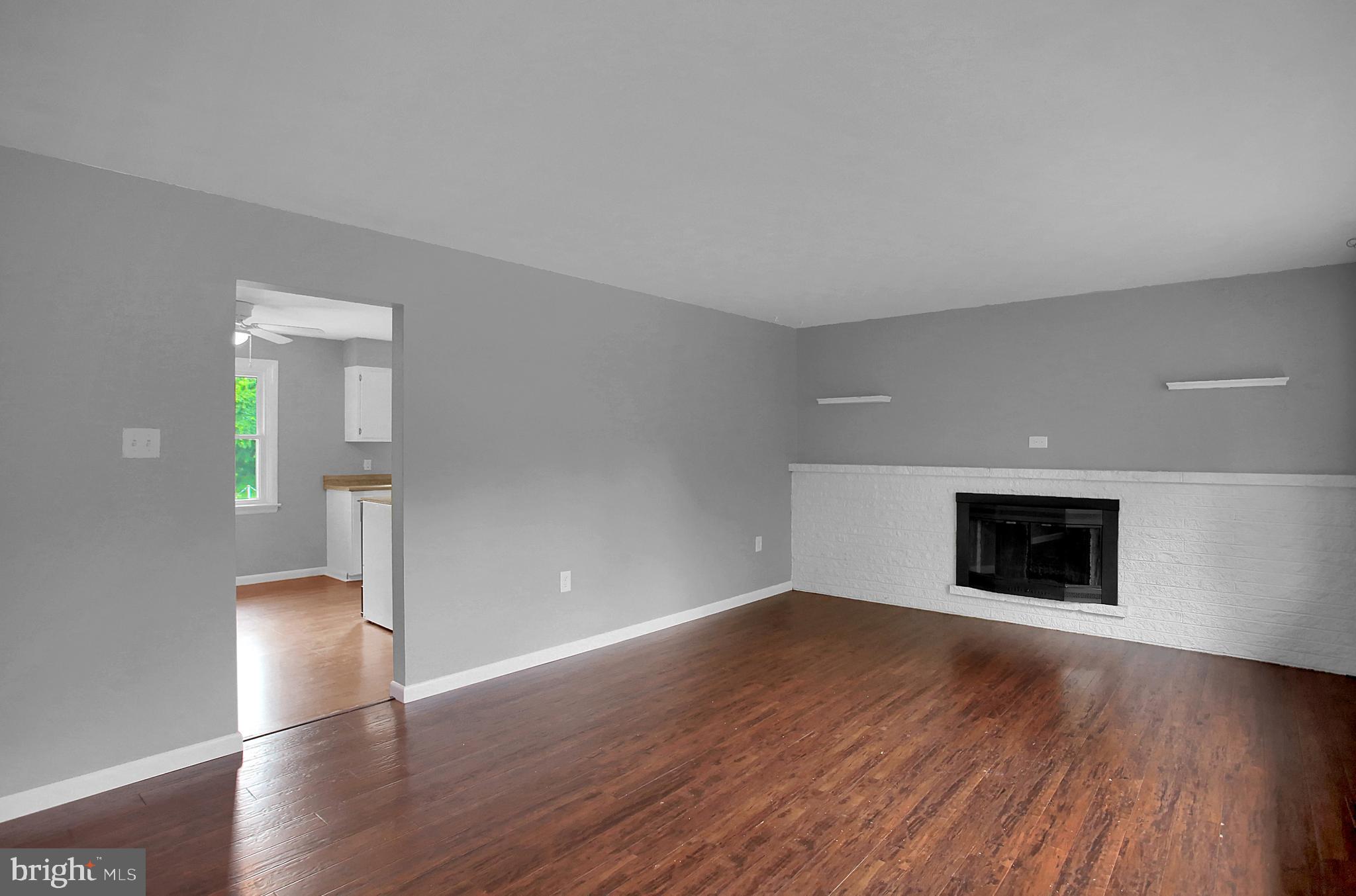 512 Ellencroft Road Lewisberry, PA 17339 - Photo 4 of 26 Living Room with Wood Burning Fireplace