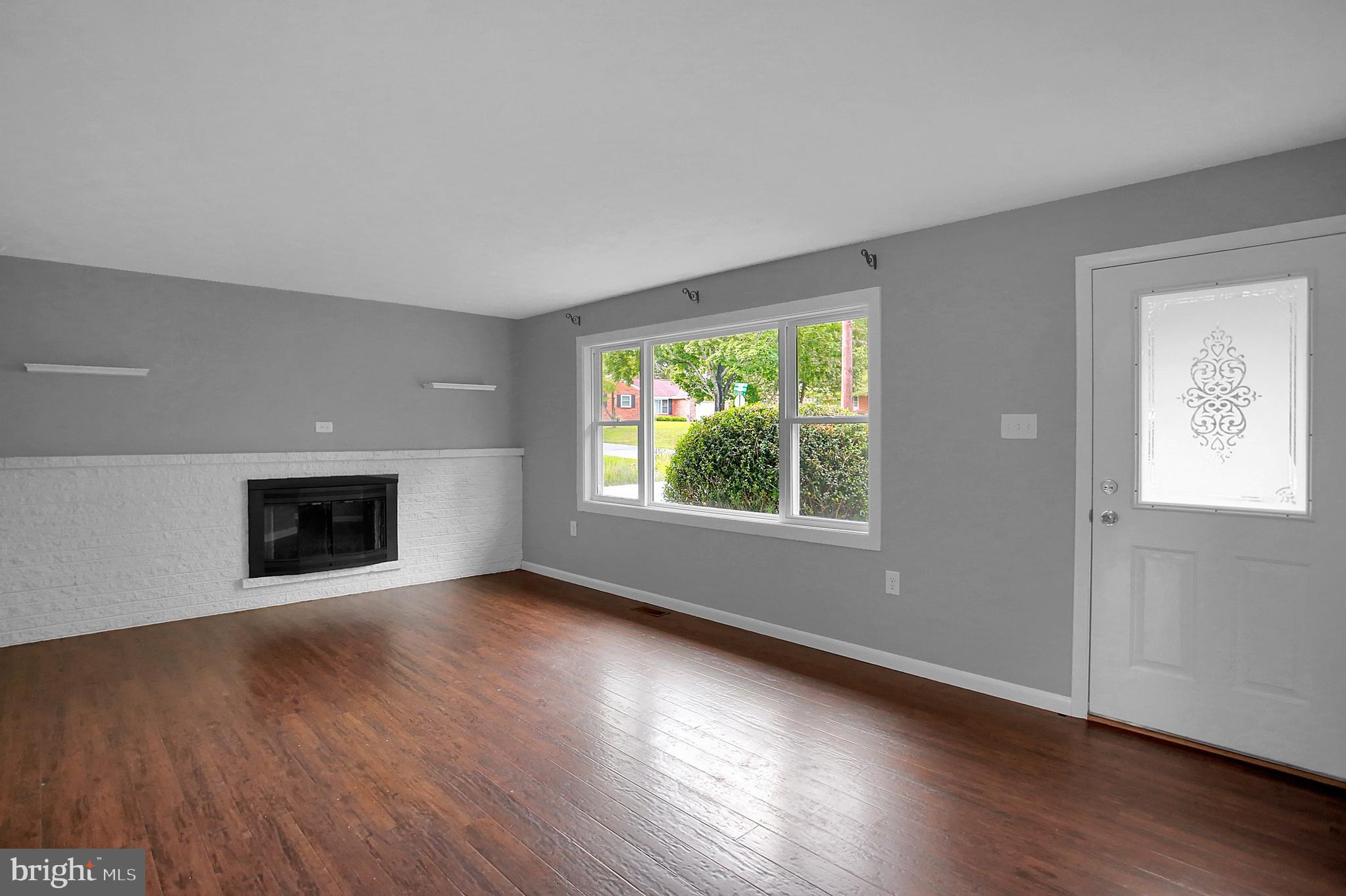 512 Ellencroft Road Lewisberry, PA 17339 - Photo 5 of 26 Living Room with Wood Burning Fireplace