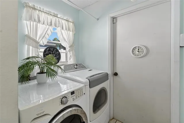 a bathroom with a sink and a window