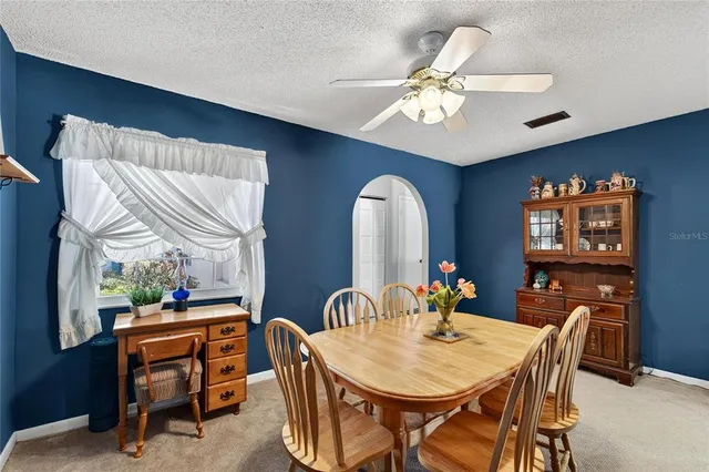 a bedroom with bed and a tv