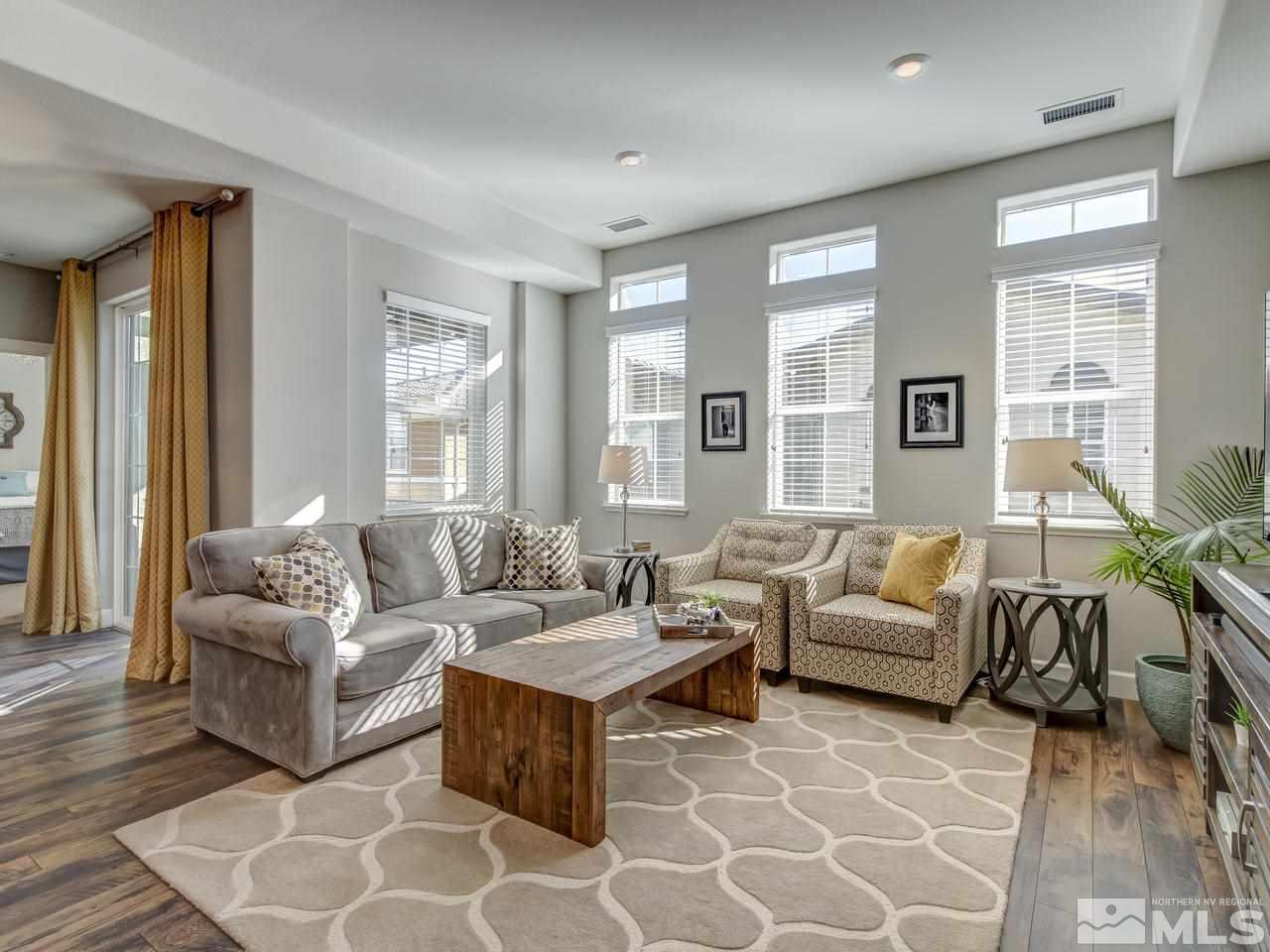 2003 Wind Ranch Road, Unit A Reno, NV 89521 - Photo 5 of 20 a living room with furniture and a large window