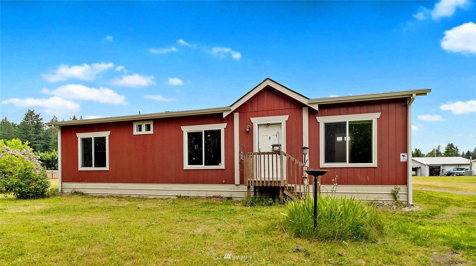 a front view of a house with yard