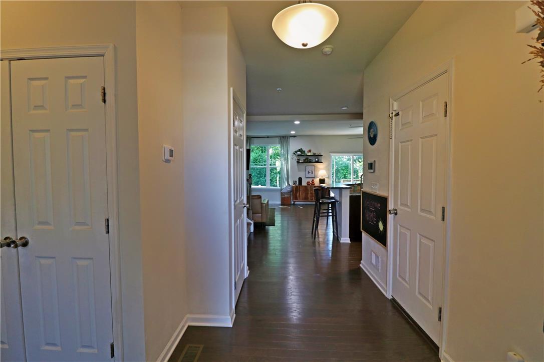 4502 Benjamin Court Emmaus, PA 18049 - Photo 4 of 53 Rich hardwood floors welcome you into this inviting open-concept living space.