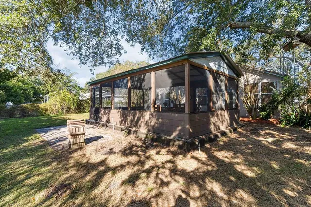 a view of yard covered with snow