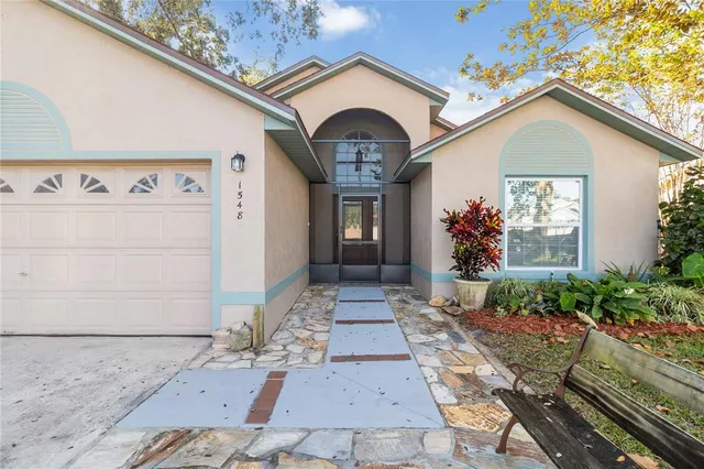a view of a house with entrance gate