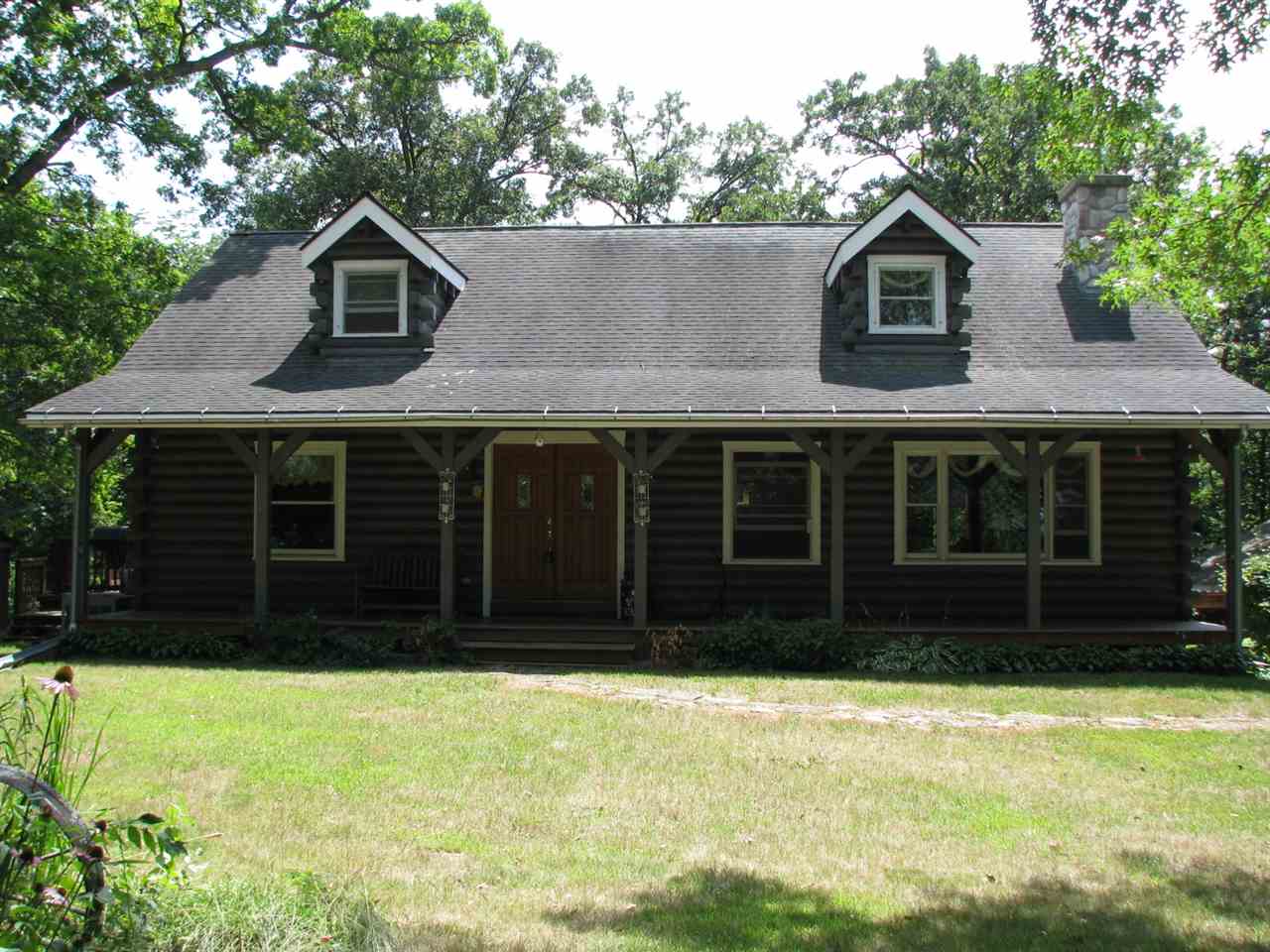 24567 County Line Road South Beloit, IL 61080 - Photo 1 of 25 a front view of a house with a yard