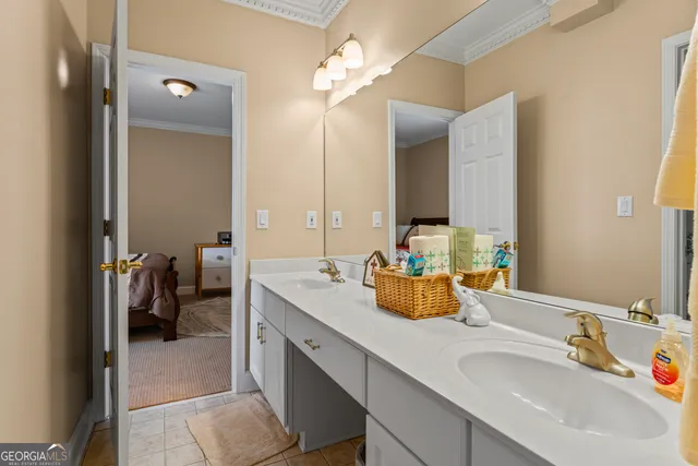 a bathroom with a sink double vanity and a mirror
