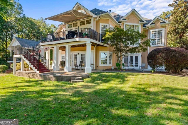 a front view of a house with swimming pool