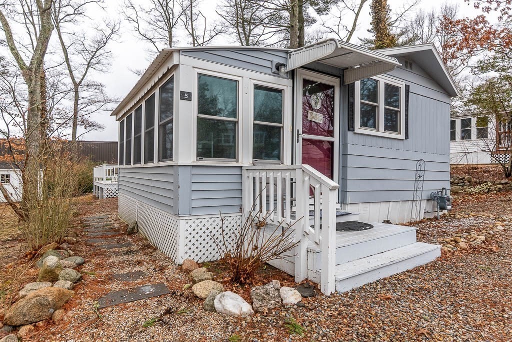 5 Timber Lane Wareham, MA 02571 - Photo 1 of 31 a front view of a house with a porch