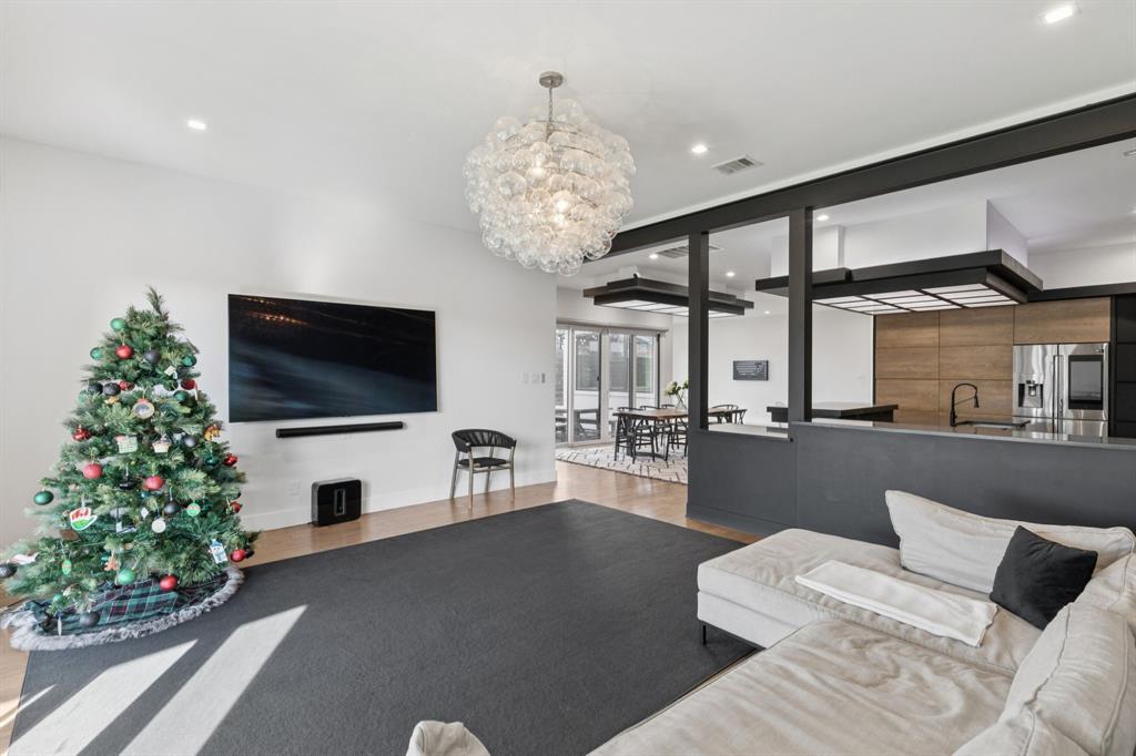 2231 Madera Street Dallas, TX 75206 - Photo 15 of 37 a living room with furniture and a flat screen tv
