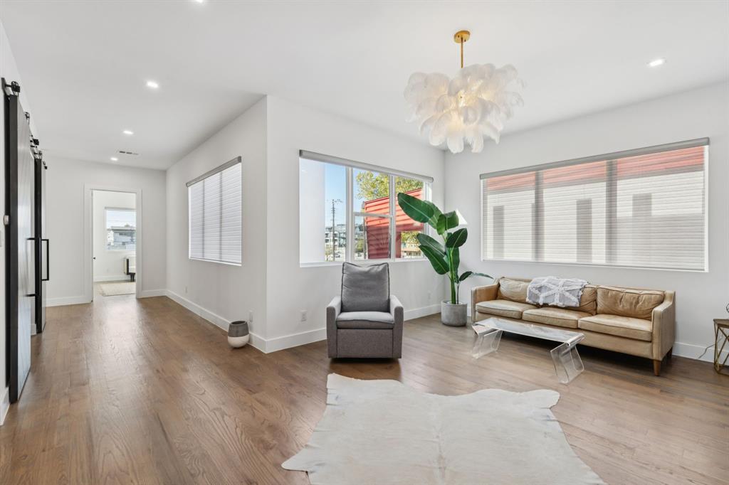 2231 Madera Street Dallas, TX 75206 - Photo 18 of 37 a living room with furniture and a large window