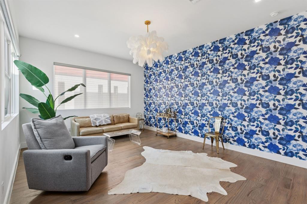 2231 Madera Street Dallas, TX 75206 - Photo 19 of 37 a living room with furniture and a large window