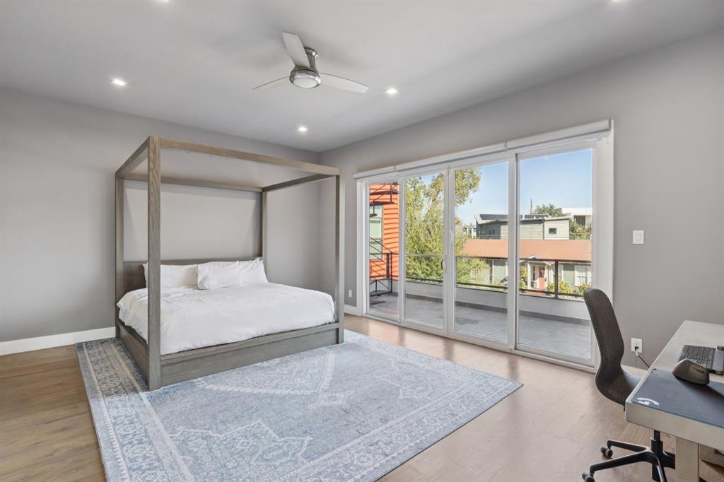 2231 Madera Street Dallas, TX 75206 - Photo 28 of 37 a bedroom with a bed a desk and chair