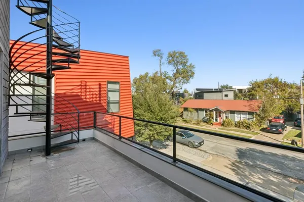 a view of a building from a balcony