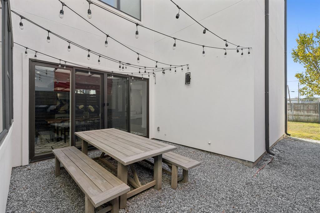 2231 Madera Street Dallas, TX 75206 - Photo 37 of 37 a wooden bench sitting in front of a building