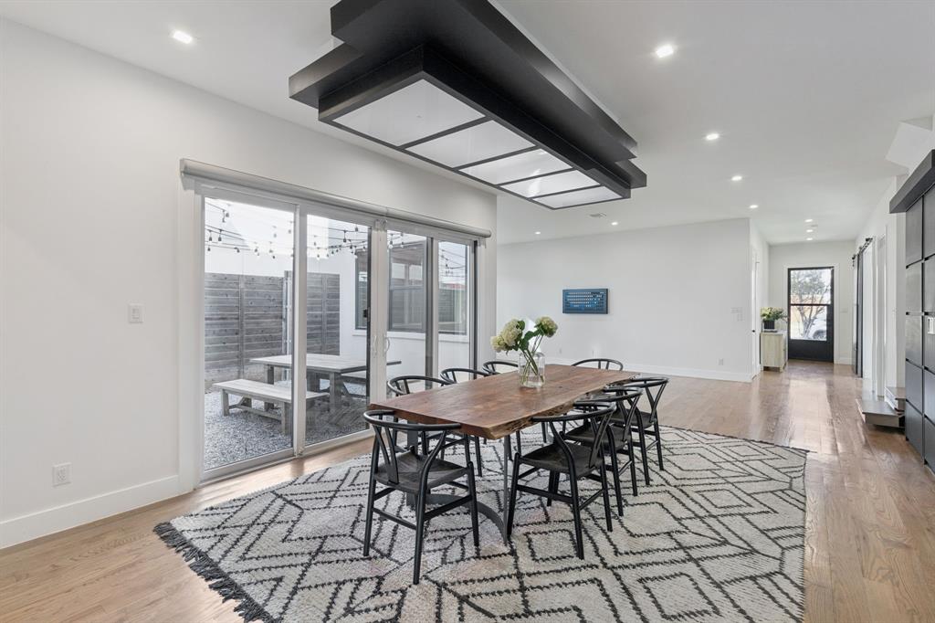 2231 Madera Street Dallas, TX 75206 - Photo 9 of 37 a view of a dining room with furniture window and wooden floor