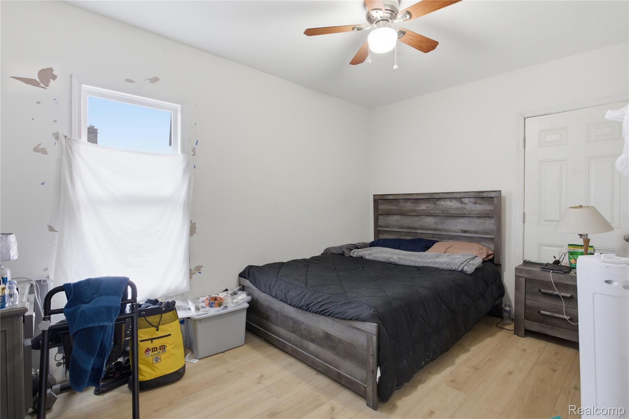 4624 Pacific Street Detroit, MI 48204 - Photo 26 of 39 Bedroom with light wood-style flooring and a ceiling fan