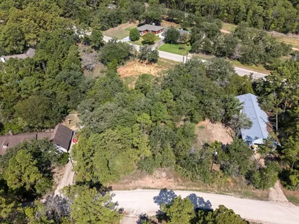 an aerial view of residential house with outdoor space and street view