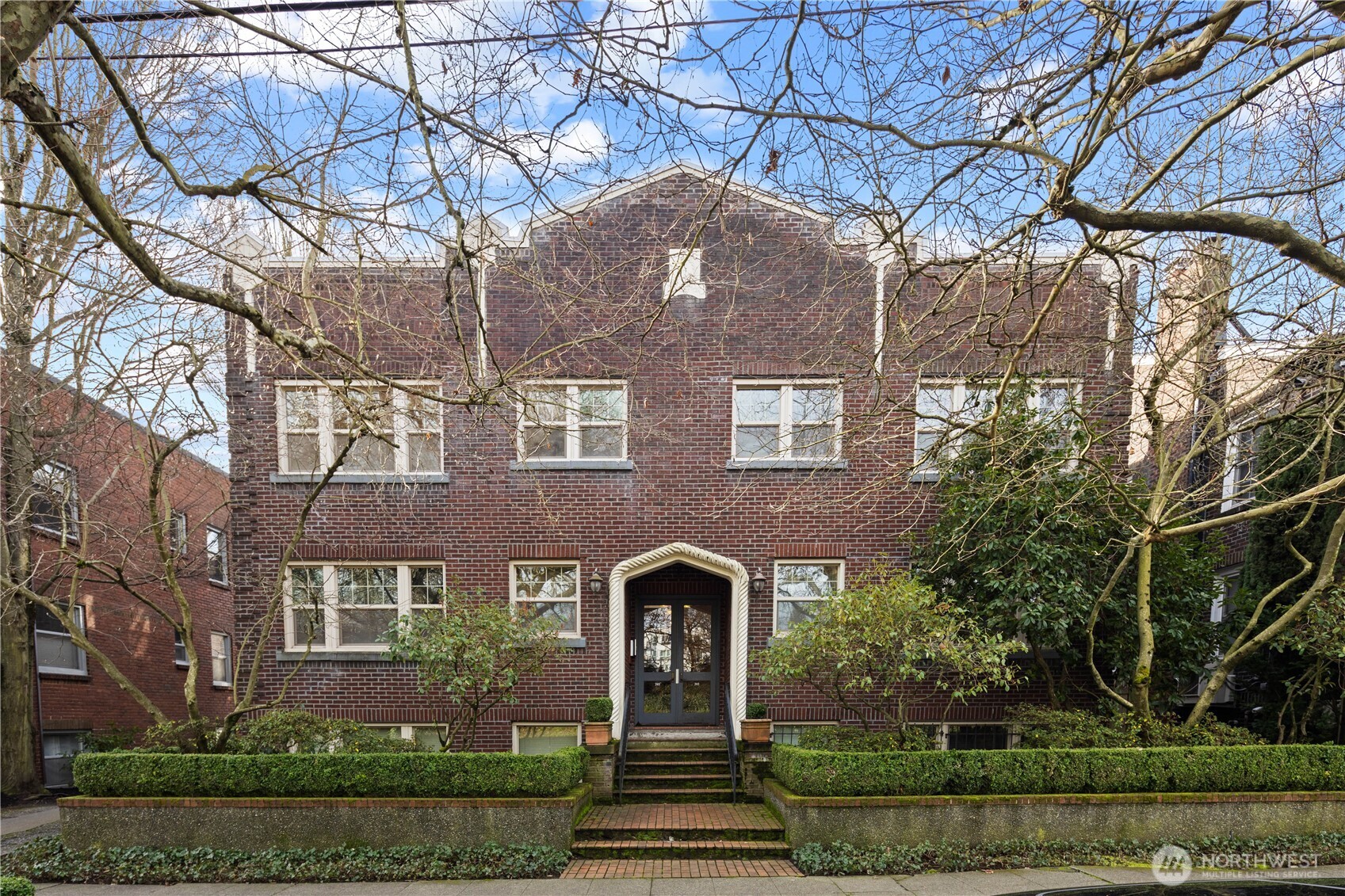 741 Federal Avenue East Seattle, WA 98102 - Photo 1 of 21 a front view of a house