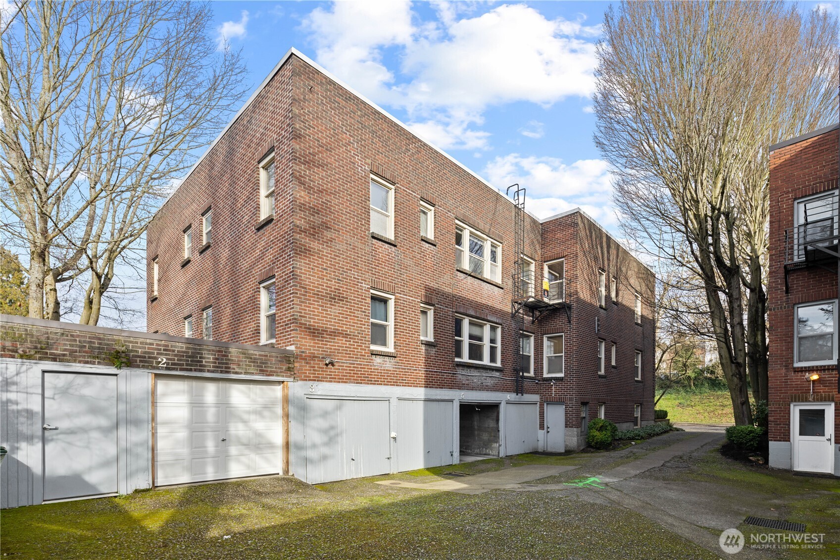 741 Federal Avenue East Seattle, WA 98102 - Photo 17 of 21 a view of a building with a yard