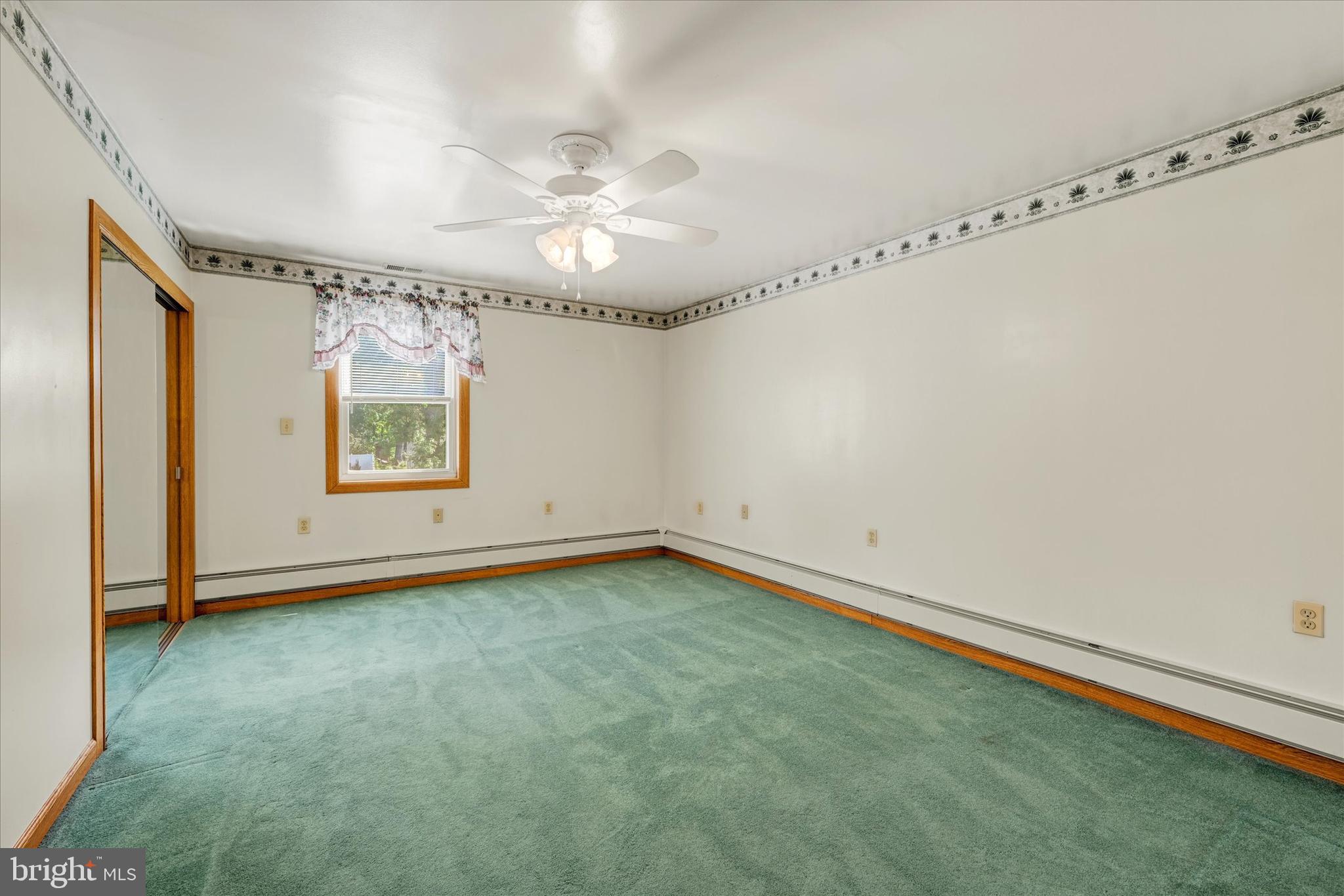 7848 Oakdale Avenue Rosedale, MD 21237 - Photo 21 of 46 a view of an empty room with a window