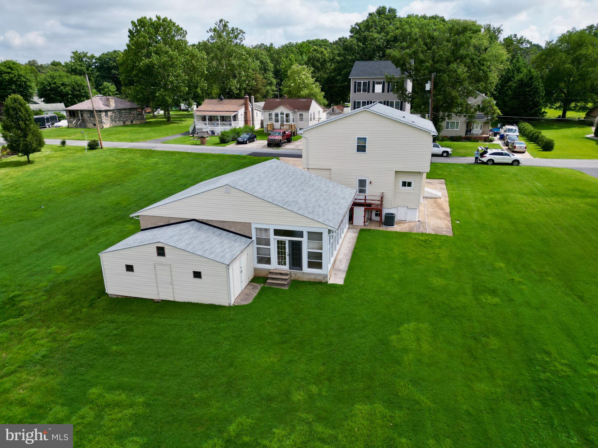 7848 Oakdale Avenue Rosedale, MD 21237 - Photo 36 of 46 a aerial view of a house with backyard garden and trees