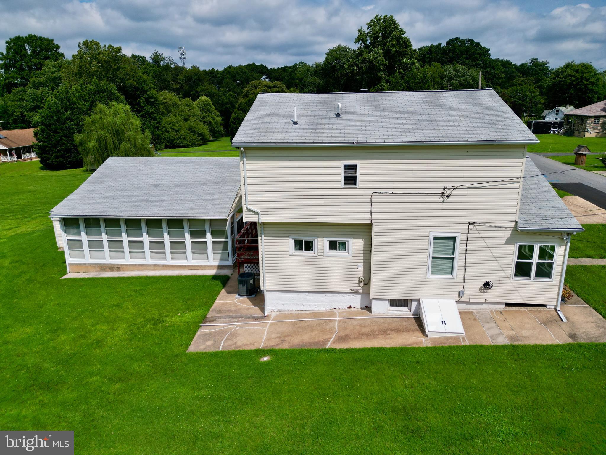 7848 Oakdale Avenue Rosedale, MD 21237 - Photo 40 of 46 a aerial view of a house with a yard table and chairs