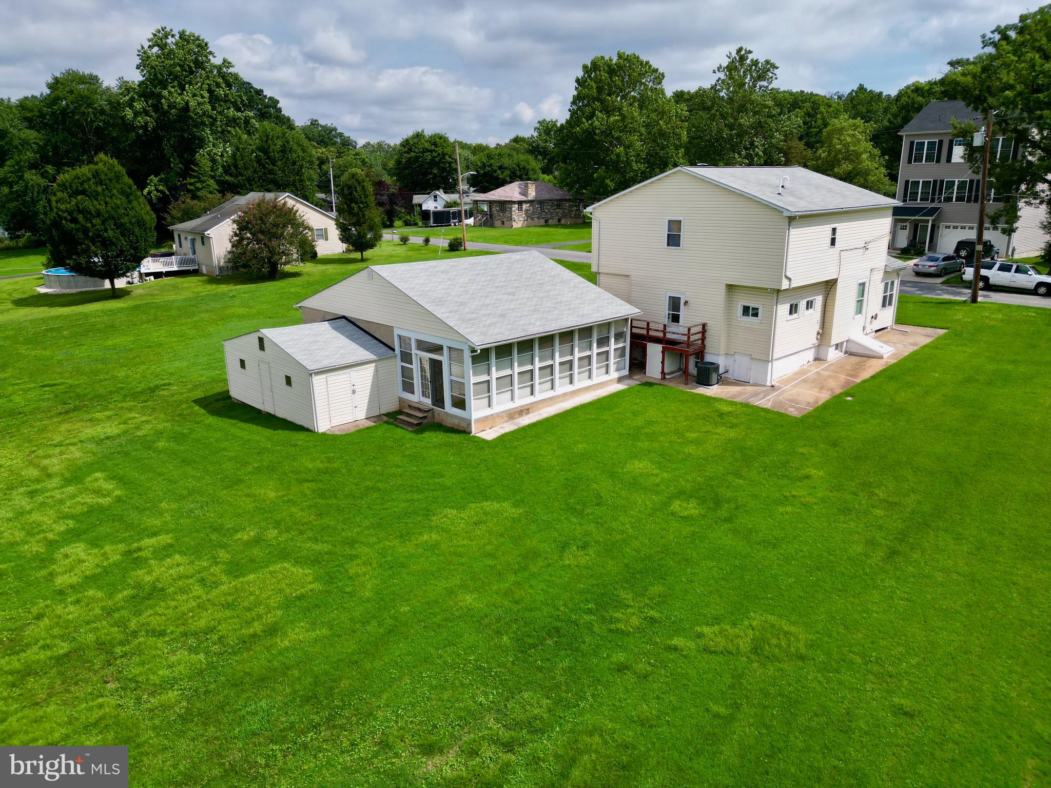 7848 Oakdale Avenue Rosedale, MD 21237 - Photo 41 of 46 a aerial view of a house with a yard and large trees