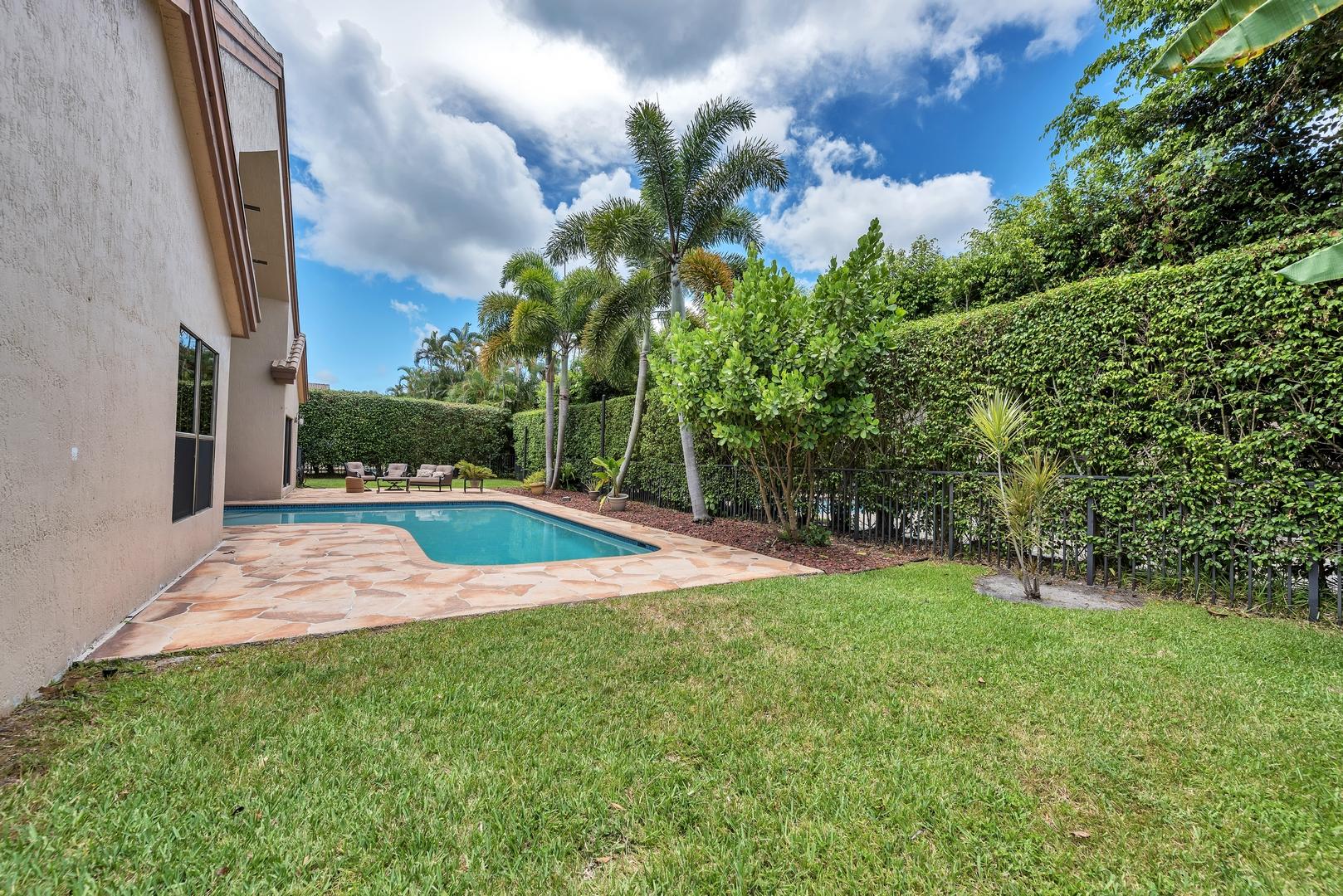 4635 Northwest 26th Avenue Boca Raton, FL 33434 - Photo 35 of 41 Pool With Yard