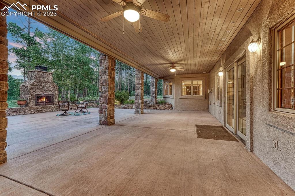 17890 Queensmere Drive Monument, CO 80132 - Photo 44 of 50 a lobby with furniture and a potted plant
