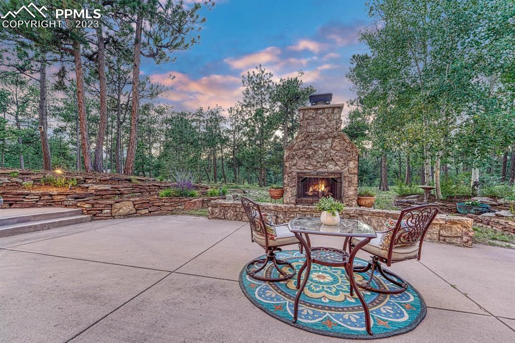 17890 Queensmere Drive Monument, CO 80132 - Photo 45 of 50 a view of a chairs and tables in the patio