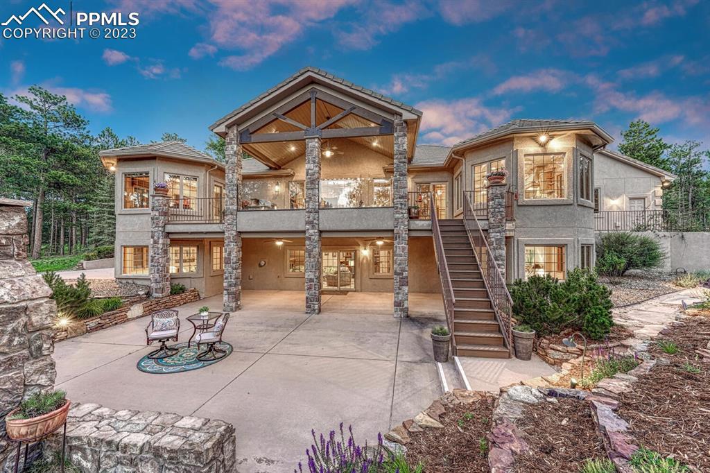 17890 Queensmere Drive Monument, CO 80132 - Photo 46 of 50 front view of a house with a porch
