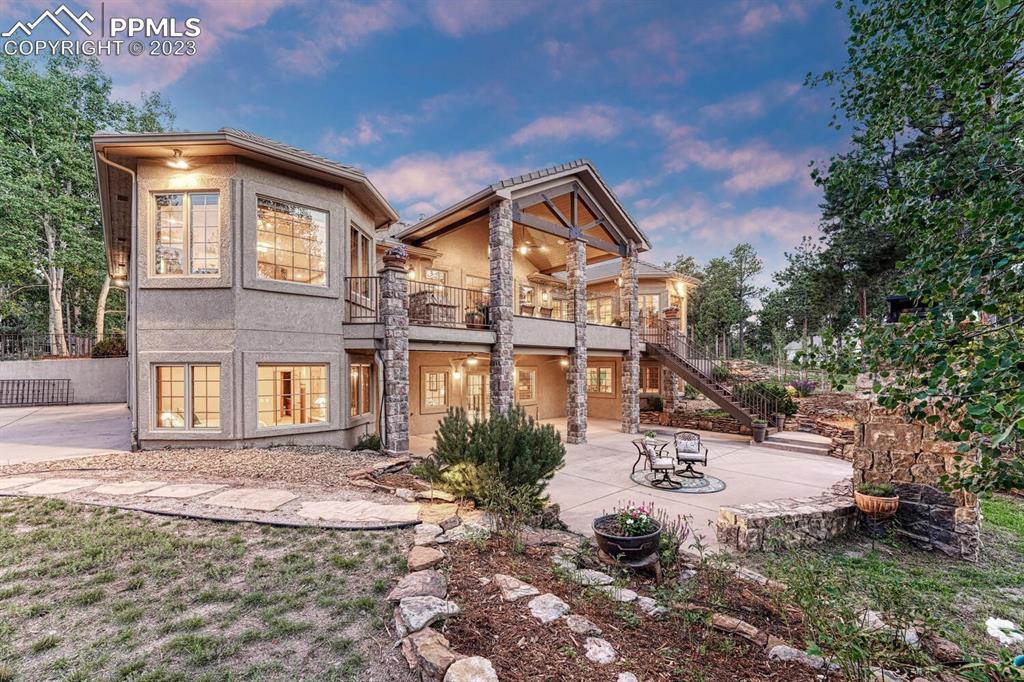 17890 Queensmere Drive Monument, CO 80132 - Photo 47 of 50 a front view of a house with a yard