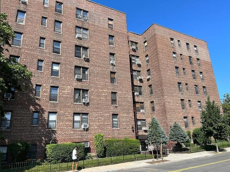 84-23 Manton Street, Unit 4A Queens, NY 11435 - Photo 1 of 18 a front view of a building