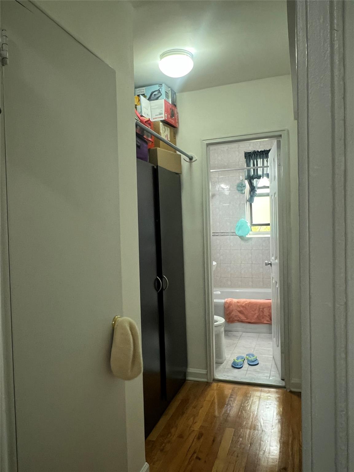 84-23 Manton Street, Unit 4A Queens, NY 11435 - Photo 15 of 18 a bathroom with a shower