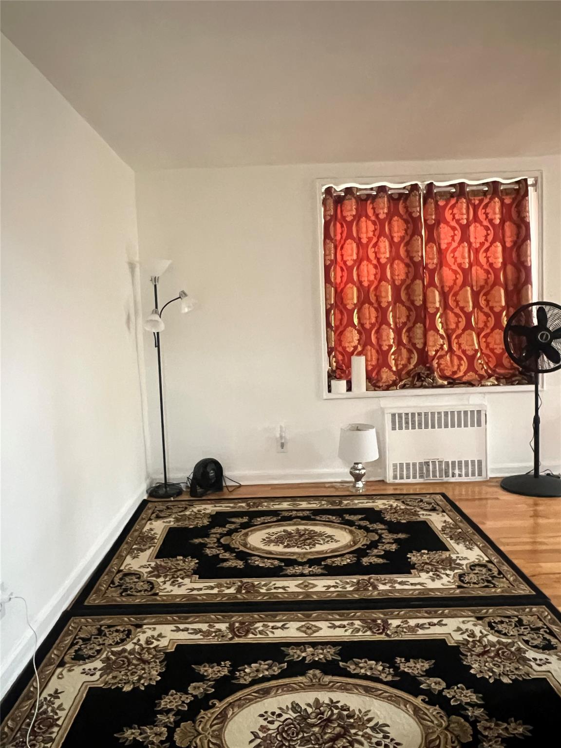 84-23 Manton Street, Unit 4A Queens, NY 11435 - Photo 16 of 18 a black and white photo of a book