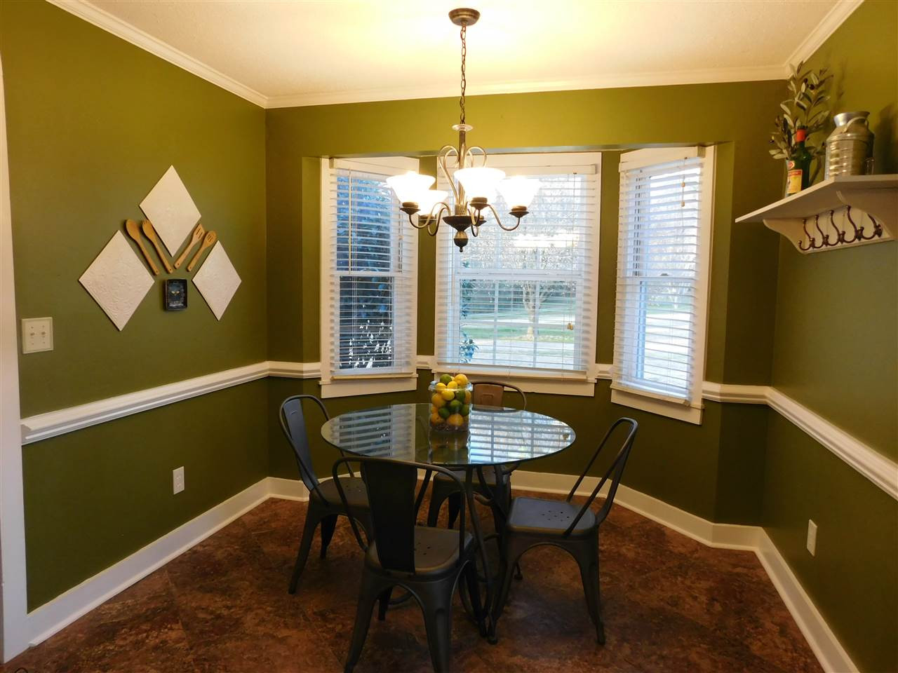 5217 Carrier Way Raleigh, NC 27603 - Photo 5 of 18 Breakfast nook with bay-window is full of light. Breakfast Area