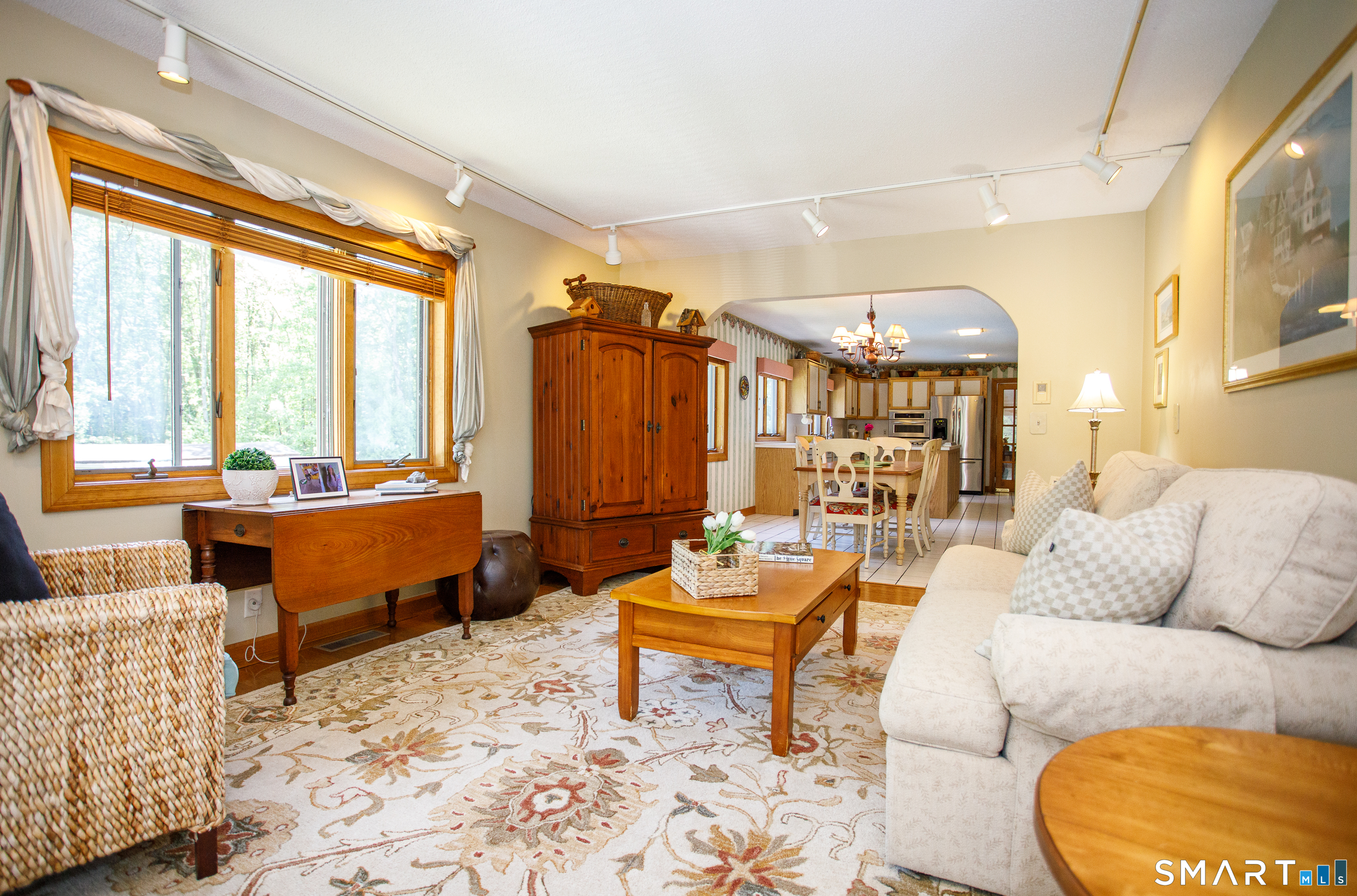 25 Stony Ridge Road Norwich, CT 06360 - Photo 5 of 40 a living room with furniture and a large window