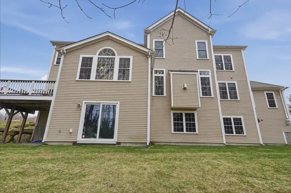 a big house with a big yard and more windows