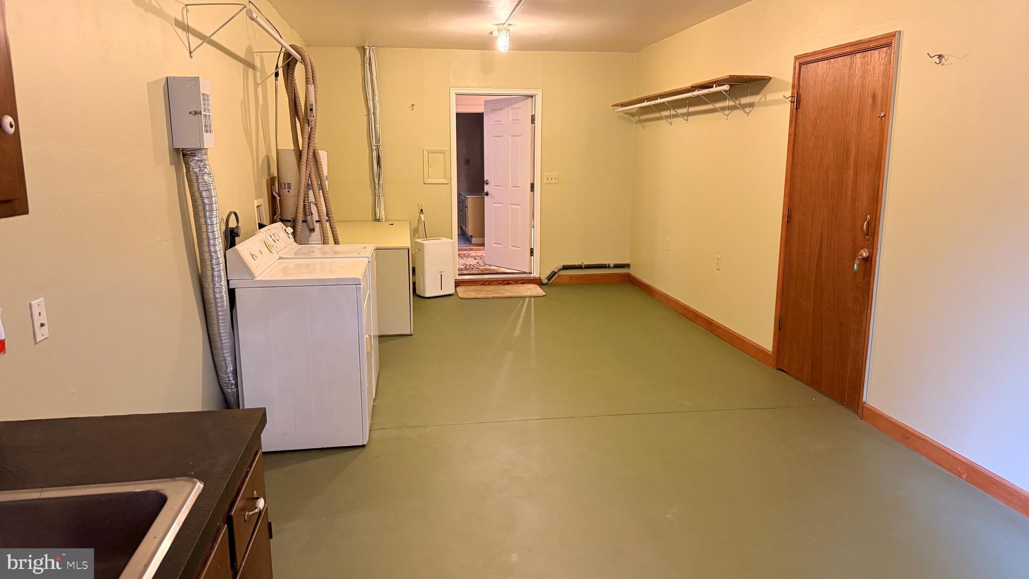 3869 Midstate Road Felton, DE 19943 - Photo 21 of 37 a bathroom with sink a mirror and shower