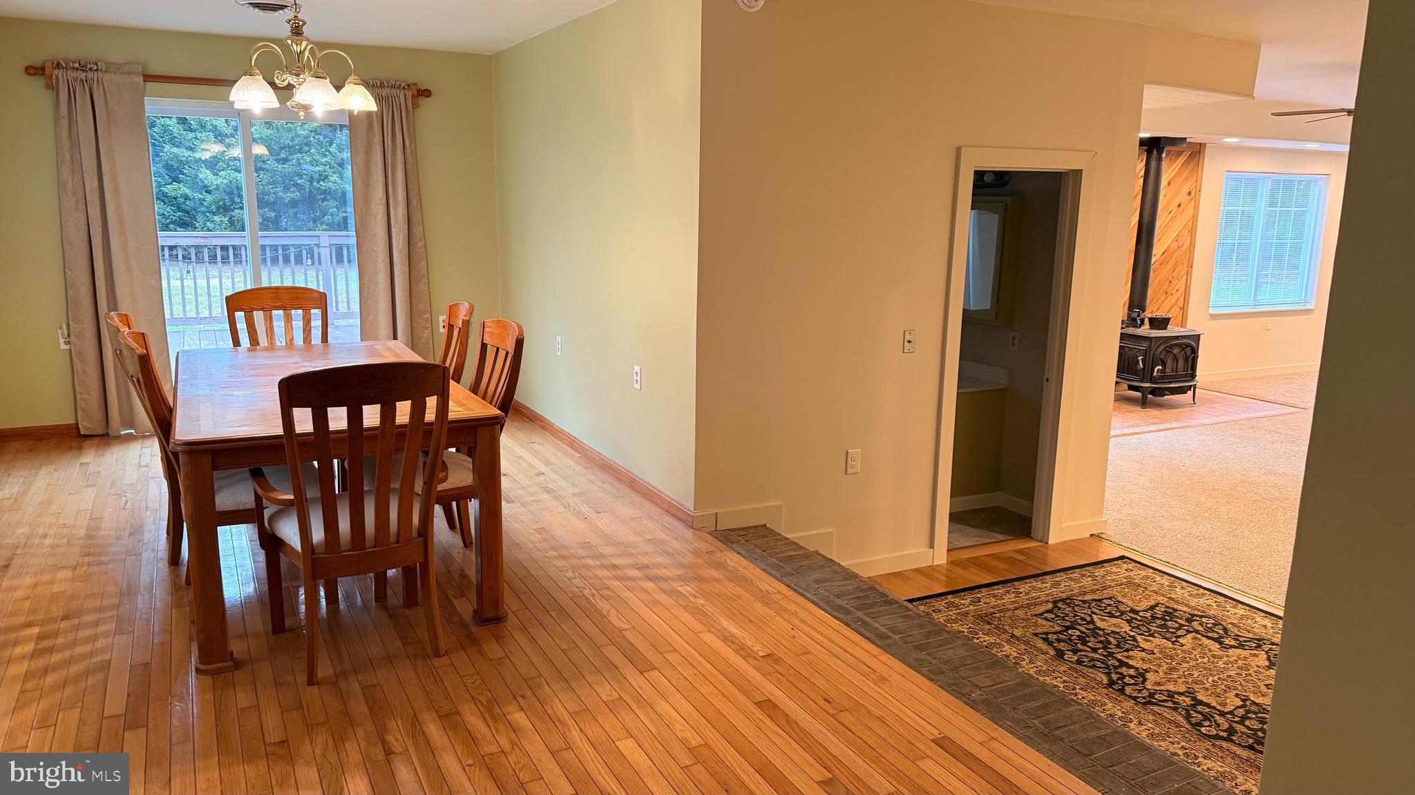 3869 Midstate Road Felton, DE 19943 - Photo 25 of 37 a view of a dining room with furniture window and wooden floor