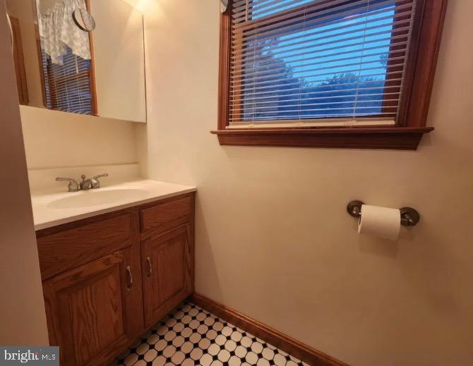 3869 Midstate Road Felton, DE 19943 - Photo 28 of 37 a bathroom with a sink and a mirror