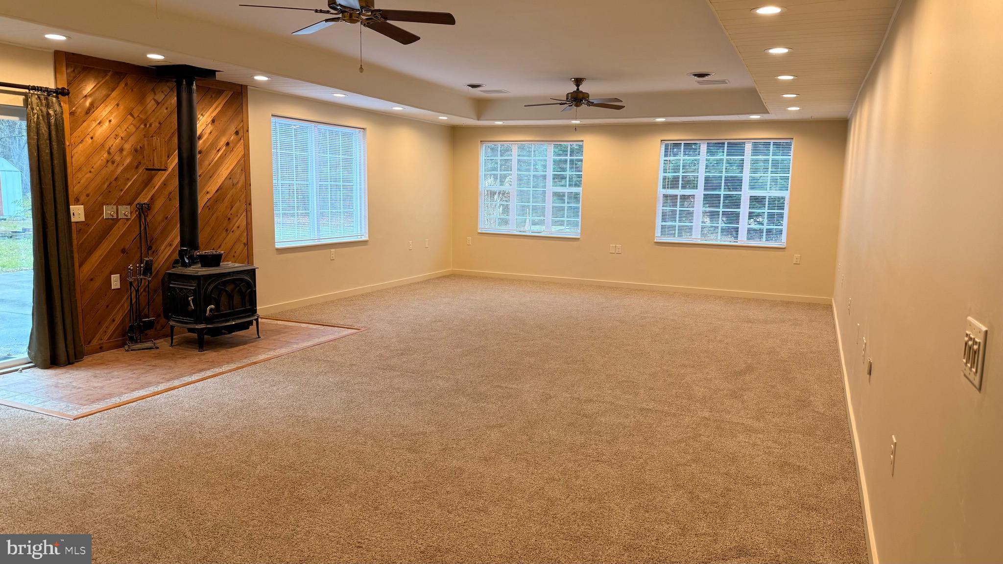 3869 Midstate Road Felton, DE 19943 - Photo 3 of 37 a view of an empty room with a window