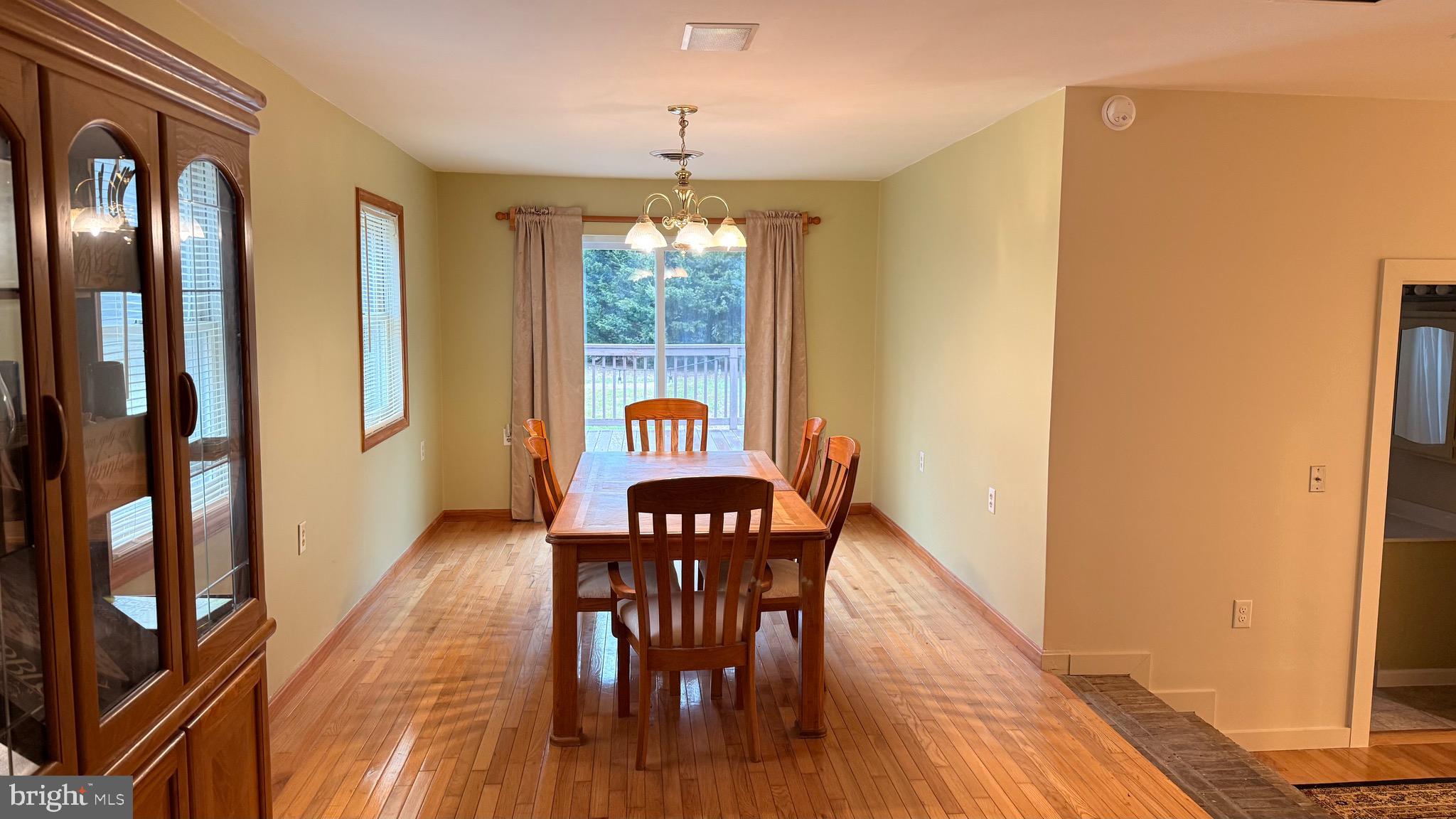 3869 Midstate Road Felton, DE 19943 - Photo 8 of 37 a view of a dining room with furniture and window